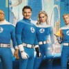 The cast of Marvel's Fantastic Four (2025) in their retro blue costumes, standing in front of a futuristic city backdrop.